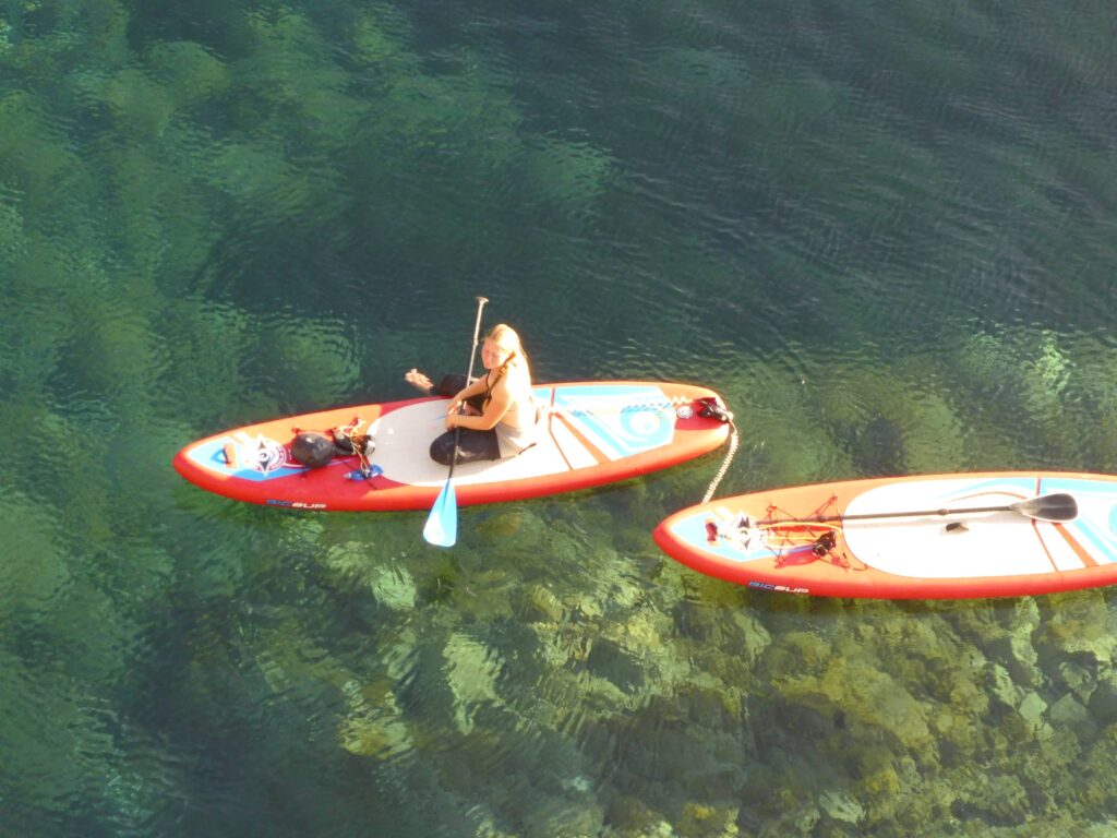 Sunset stand up paddle tour near Lipari and Vulcanello, Aeolian archipelago, Italy